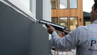 Professional caulking and sealing on Baltimore, MD home exterior for weather protection