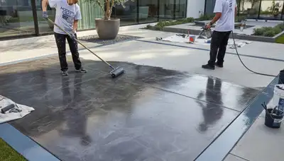 Professional concrete staining on a residential patio in Baltimore, MD by expert house painters
