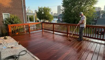 Professional deck staining in Baltimore MD enhancing wood color and protecting against UV and moisture damage