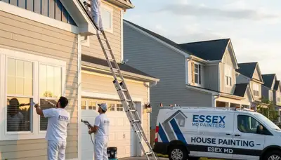 Professional house painters finishing exterior home in Baltimore MD